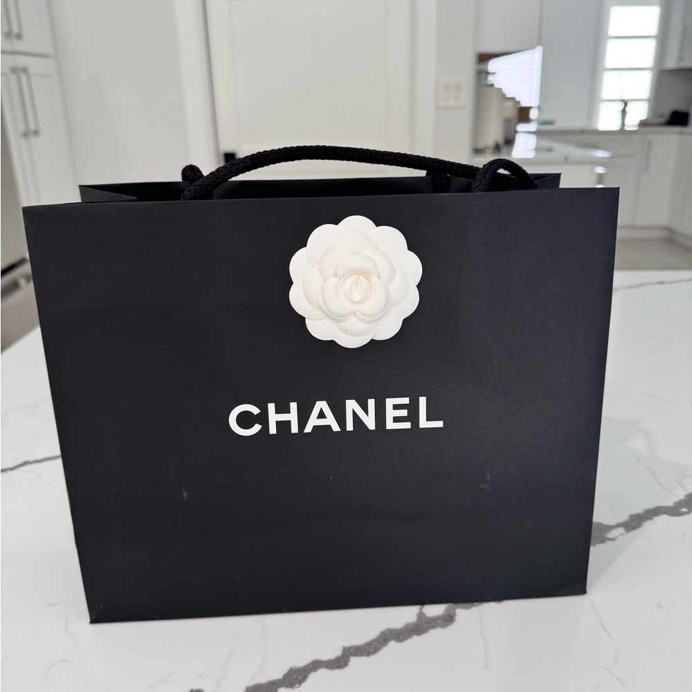 Chanel bag. Flower attached.